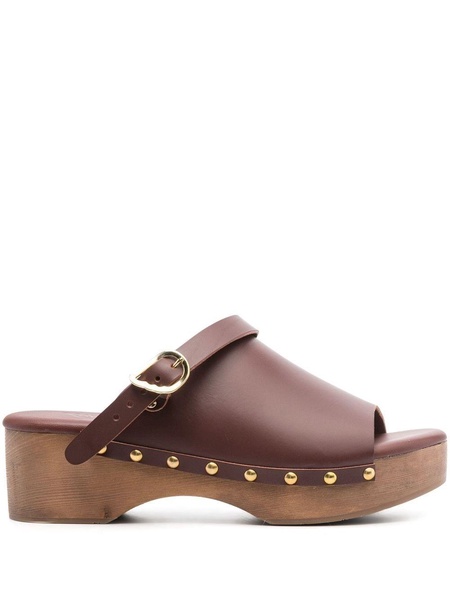 buckled leather clogs