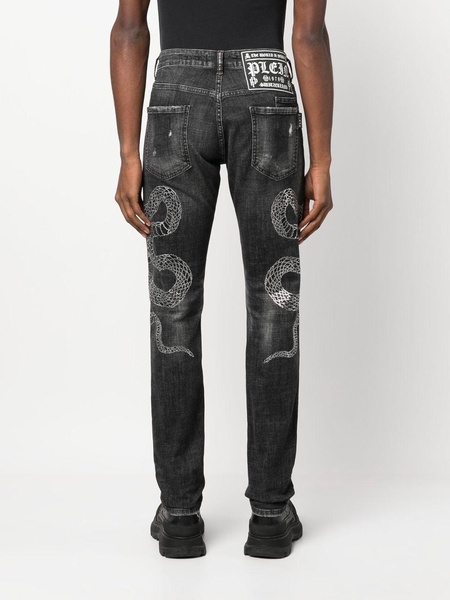 snake-motif ripped jeans