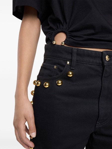 wide-leg jeans with stud embelishment