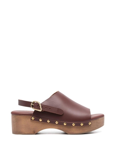 buckled leather clogs