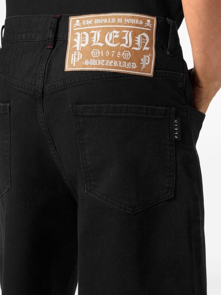 skull-embroidered denim shorts