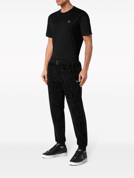 gothic-print drawstring-waist track pants