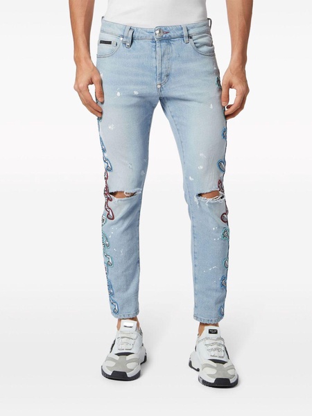 Skully Gang low-rise skinny jeans