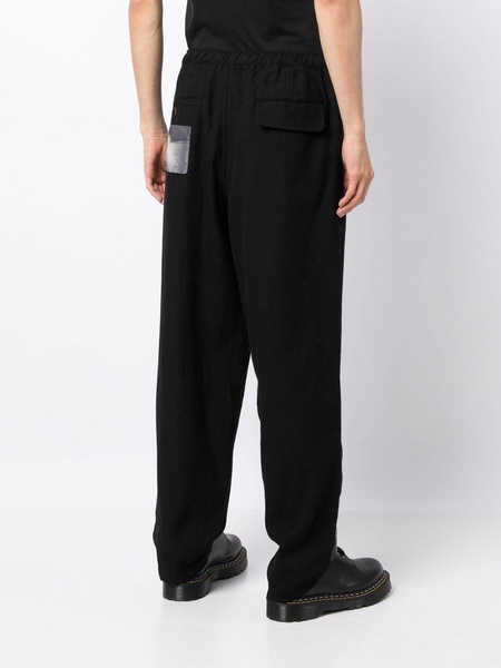 graphic-patch wool trousers