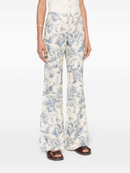 floral-print flared trousers