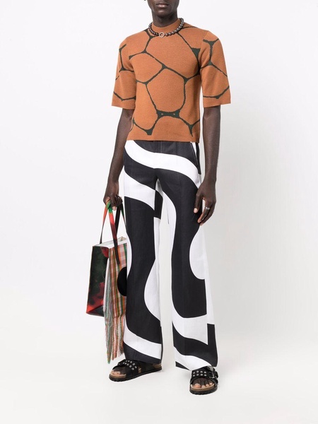 x Kenneth swirl-print trousers