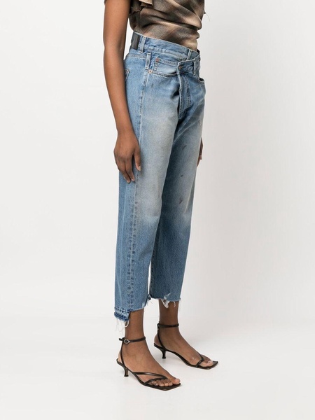 off-centre distressed denim trousers