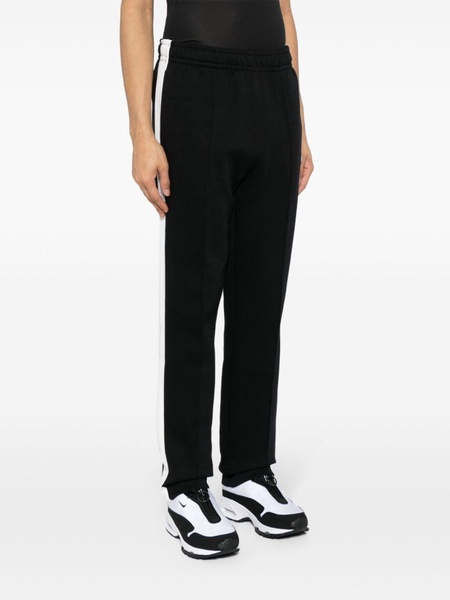 crocodile-appliqué track pants