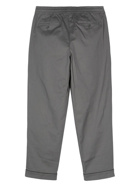 low-waist slim-fit trousers