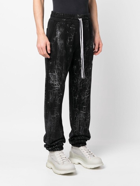 cracked-dye logo track pants