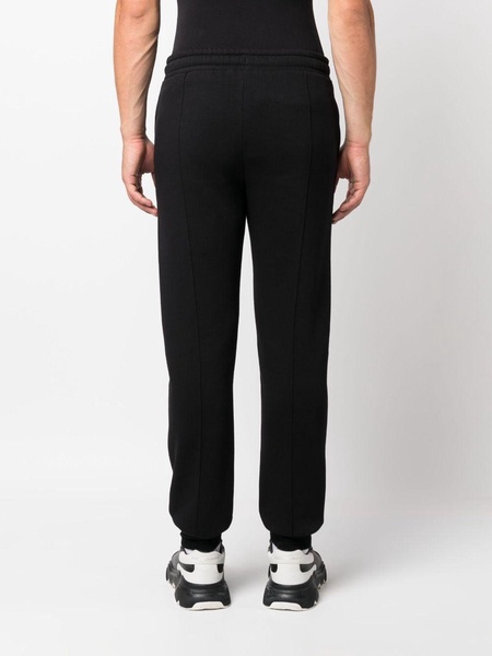 Hotel Karl logo-print track pants