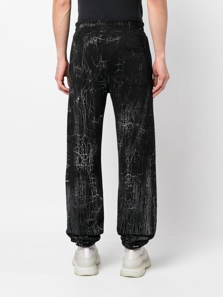 cracked-dye logo track pants