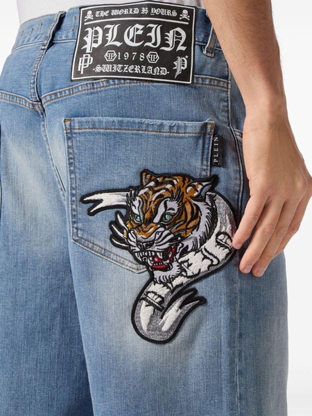 Tiger-appliqué denim shorts