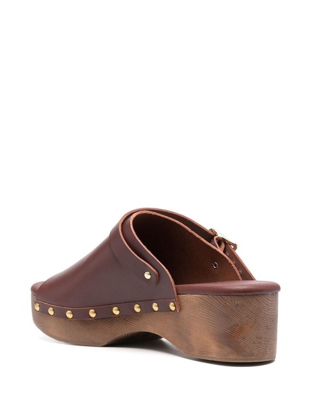 buckled leather clogs