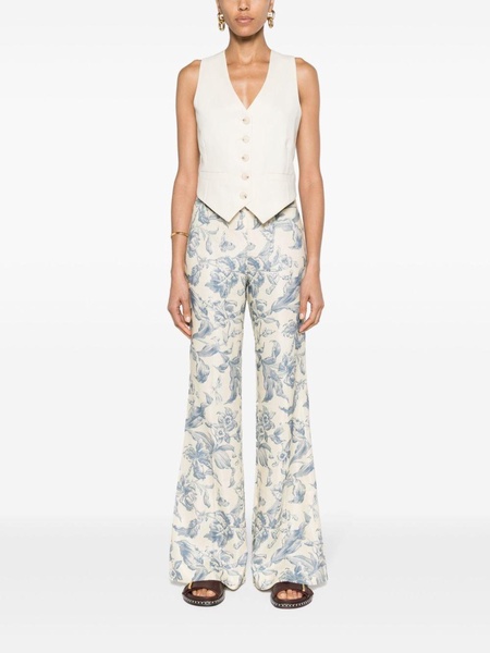 floral-print flared trousers