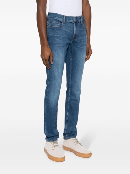 Paxtyn mid-rise skinny jeans