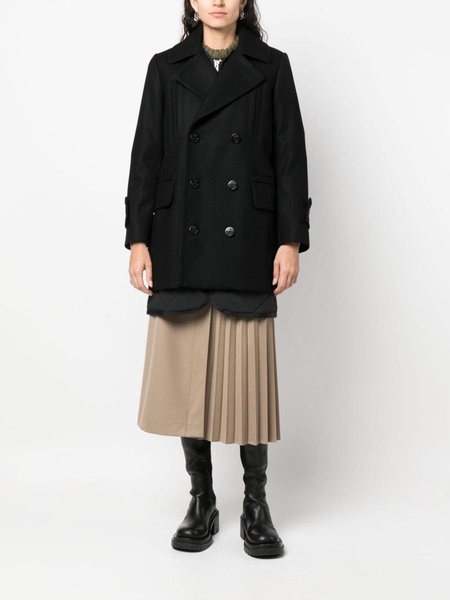 layered double-breasted wool coat