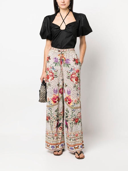 flared floral-print trousers