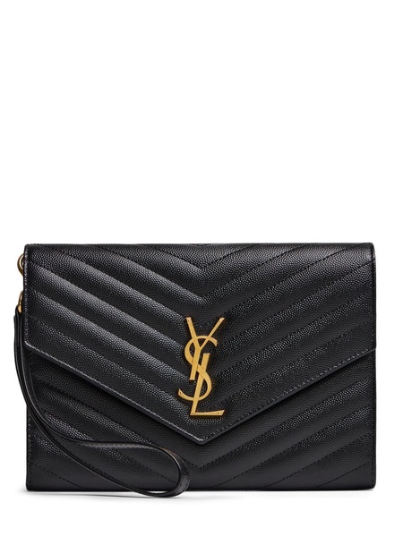 Monogram embossed leather clutch