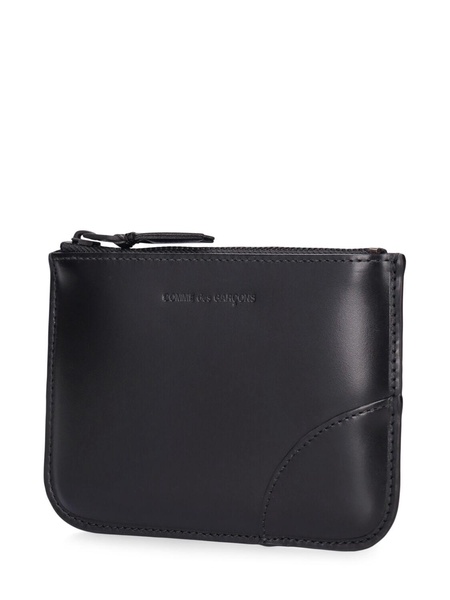 Very black leather pouch