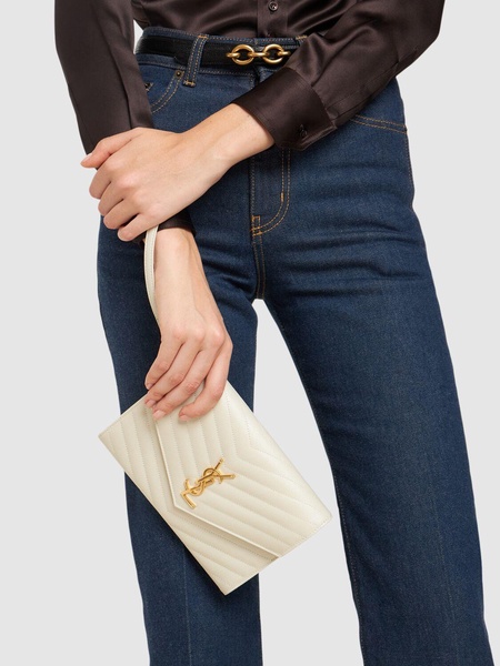 Cassandre embossed leather clutch