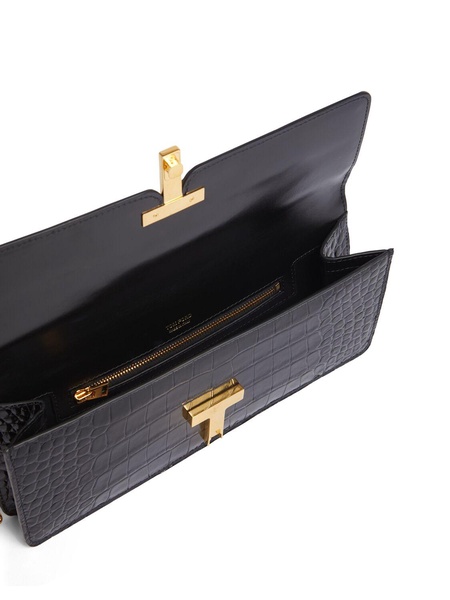 Shiny embossed leather clutch