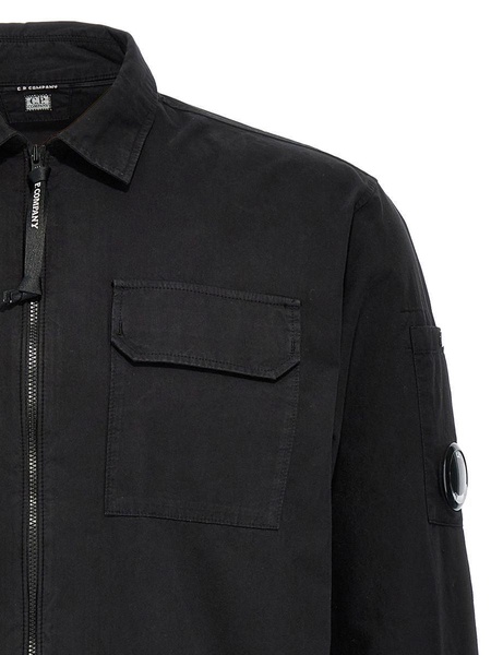 Black Jacket With Lens Motif Applied On The Sleeve In Cotton Man