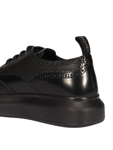 Brogue insert black leather lace-ups