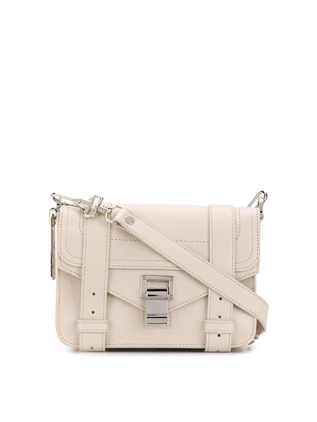 Leather flap front bag with metal tab closure