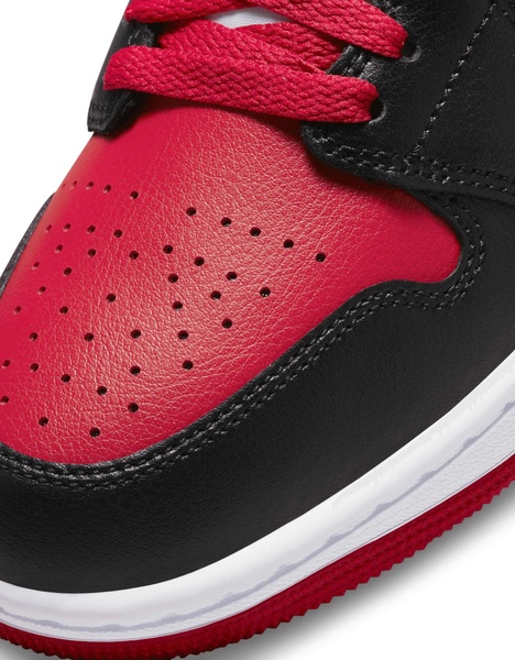 Nike Air Jordan 1 mid sneakers in black and red