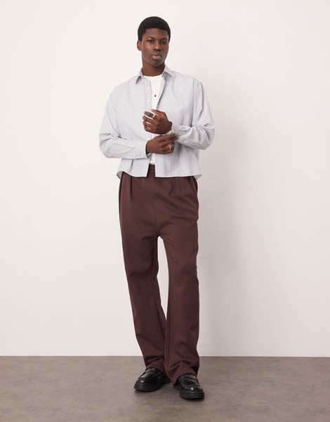 ASOS DESIGN wide leg sweatpants with front pleat in dark brown