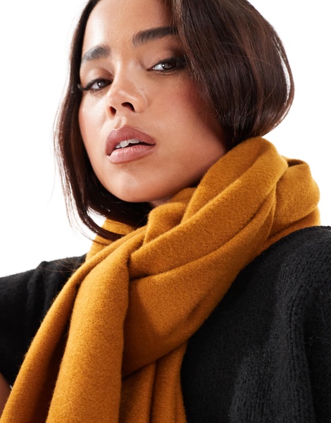 ASOS DESIGN supersoft scarf with tassels in mustard yellow