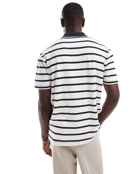 ASOS DESIGN relaxed fit polo in black and white stripe