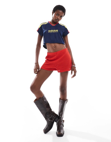 adidas Soccer Tiro crop T-shirt in navy blue with red and yellow stripes