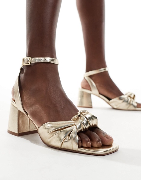 ASOS DESIGN Hansel knotted mid heeled sandals in gold