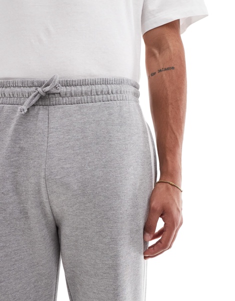 ASOS DESIGN straight leg sweatpants with textured side stripes in gray heather