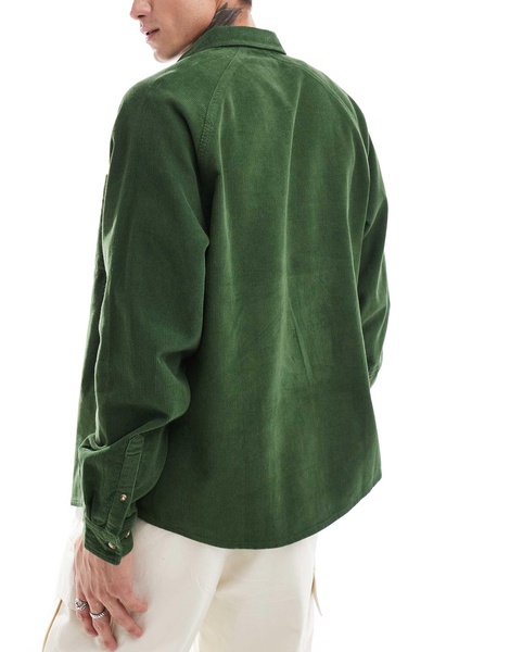 ASOS DESIGN 90s oversized cord shirt in green