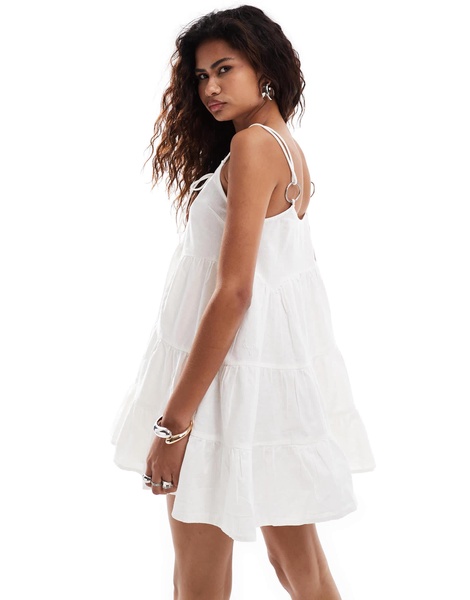 COLLUSION cotton linen tiered sun dress with bunny tie and ring detail in white