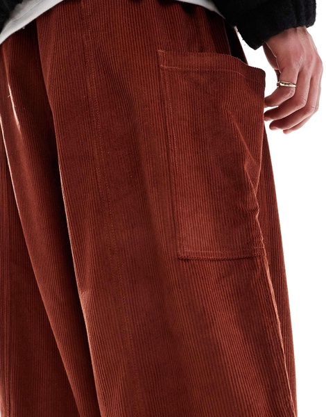 ASOS DESIGN baggy balloon cord pants with side pockets in orange