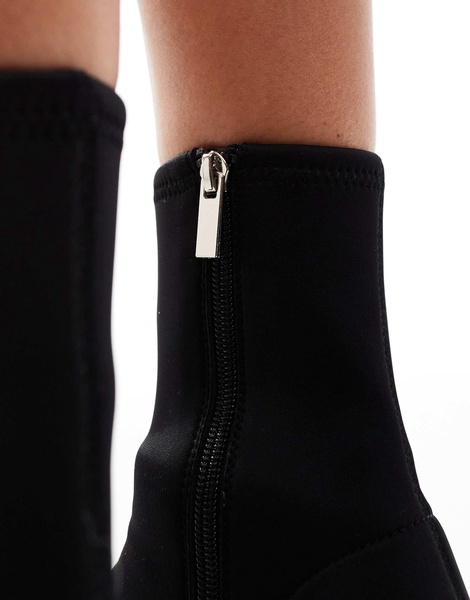 ASOS DESIGN Radiant flared block heel boots in black neoprene