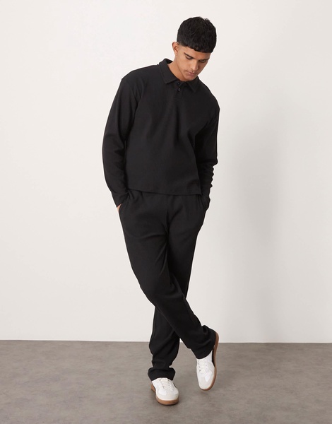 ASOS DESIGN ribbed straight leg sweatpants in washed black