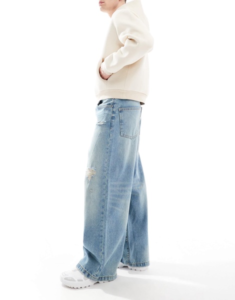 ASOS DESIGN super baggy jeans with rips in vintage light wash blue