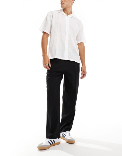 ADPT wide fit pants in black with front pleat