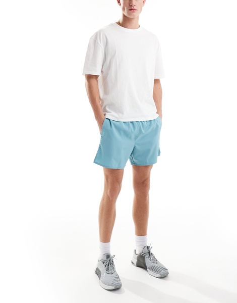 Nike Running Challenger Dri-FIT 5 inch shorts in light blue