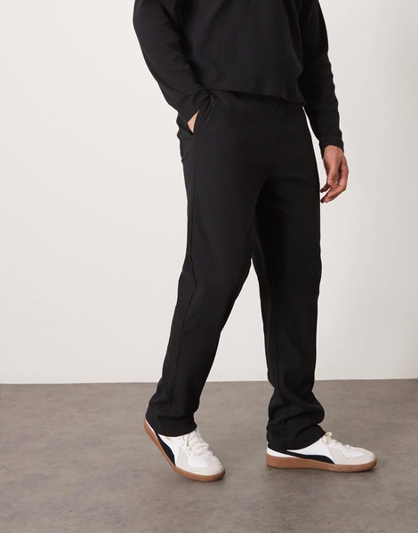 ASOS DESIGN ribbed straight leg sweatpants in washed black