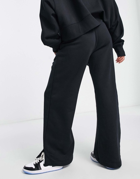 Nike Phoenix Fleece high rise wide leg sweatpants in black