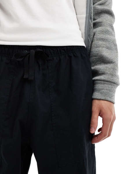 Nike Club woven Barcelona pants in black