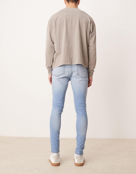 ASOS DESIGN power stretch jeans in light wash