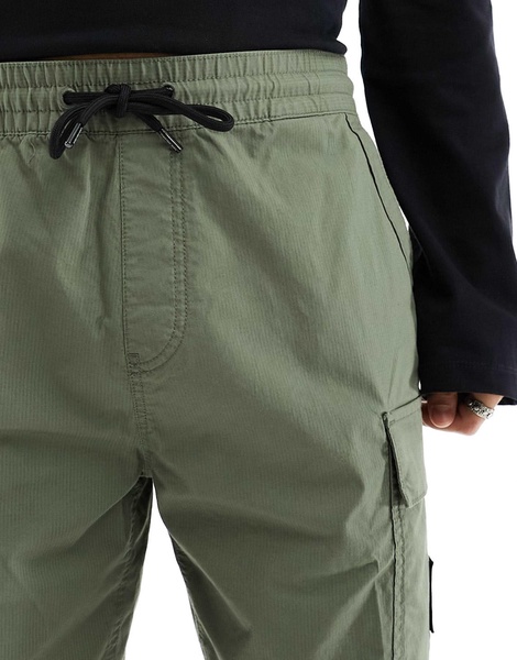 Calvin Klein Jeans washed cargo shorts in olive green