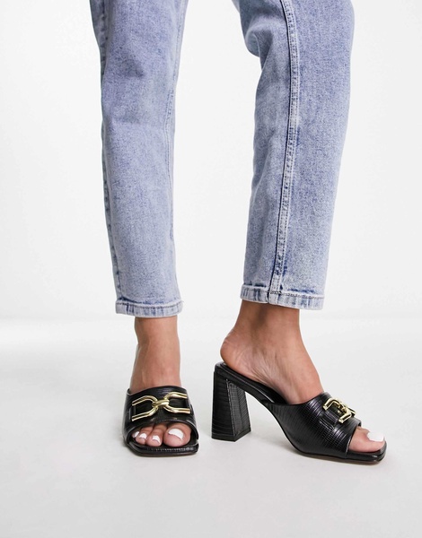 ASOS DESIGN Hush snaffle detail mid heeled mules in black